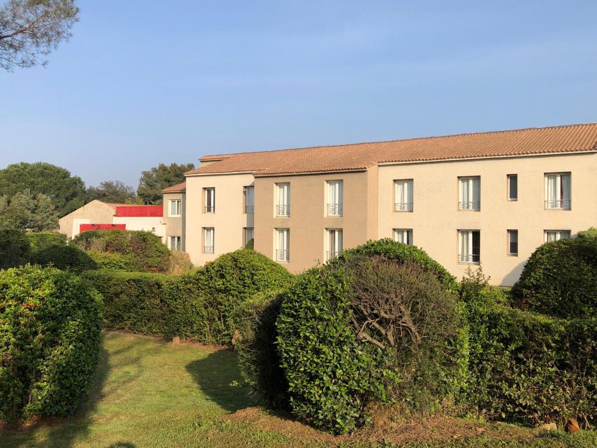 Logis Hotel Restaurant Les Aubuns Caissargues Exteriör bild