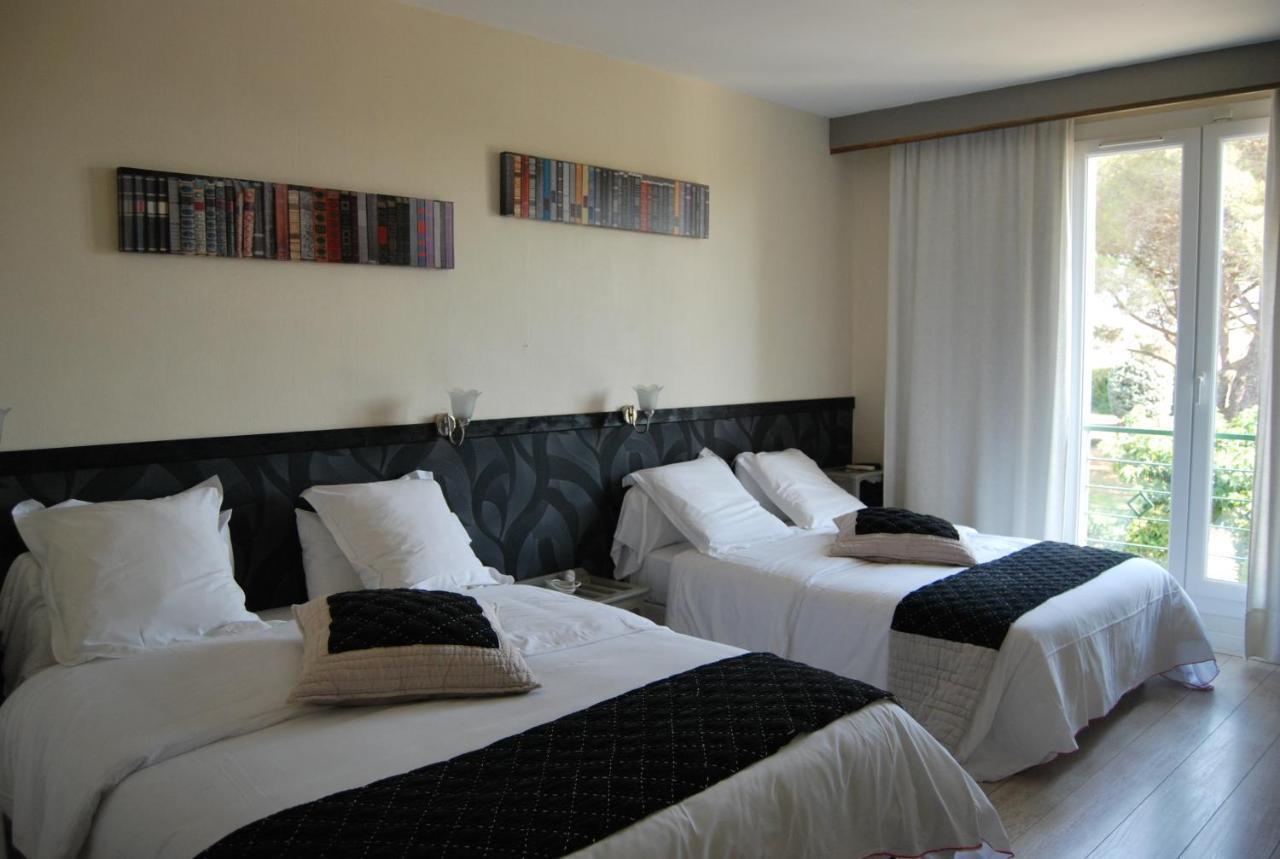 Logis Hotel Restaurant Les Aubuns Caissargues Rum bild