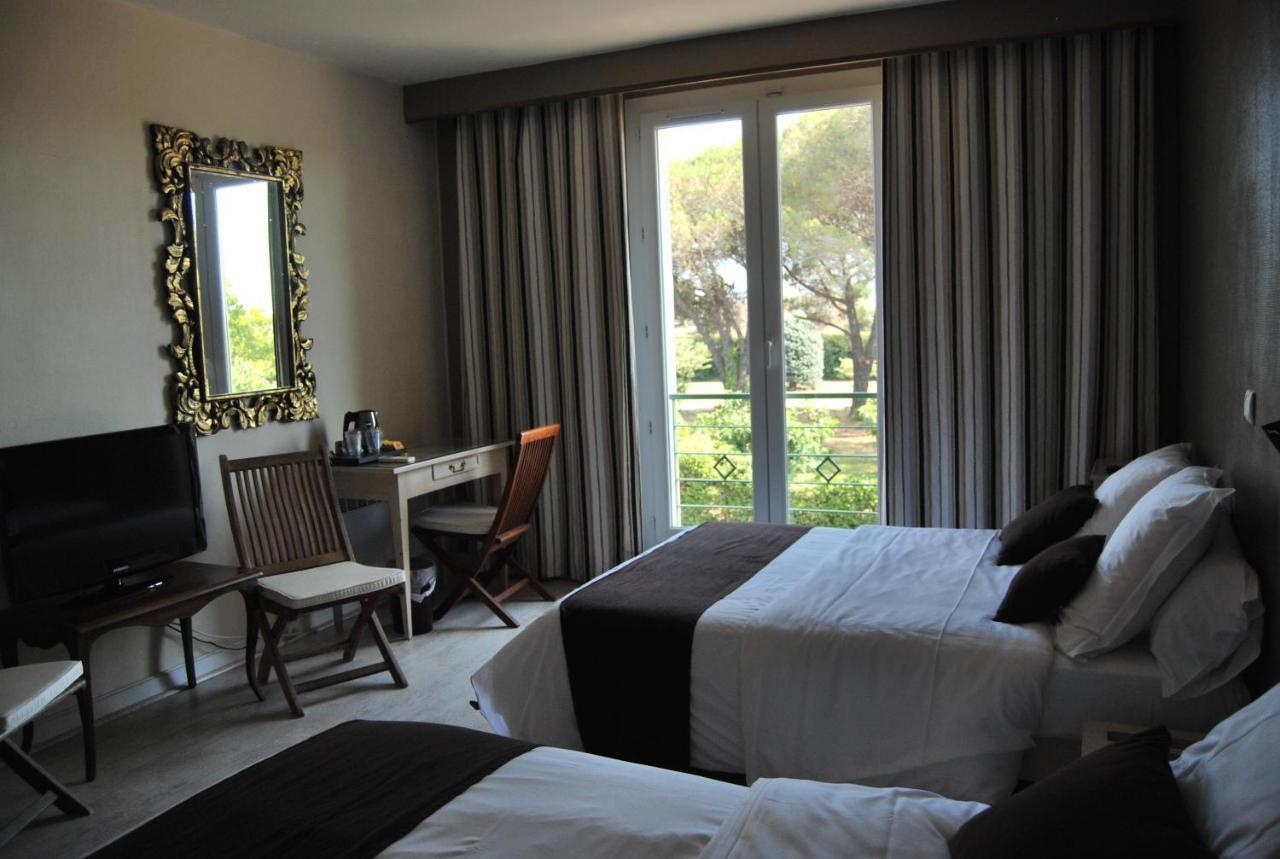 Logis Hotel Restaurant Les Aubuns Caissargues Rum bild
